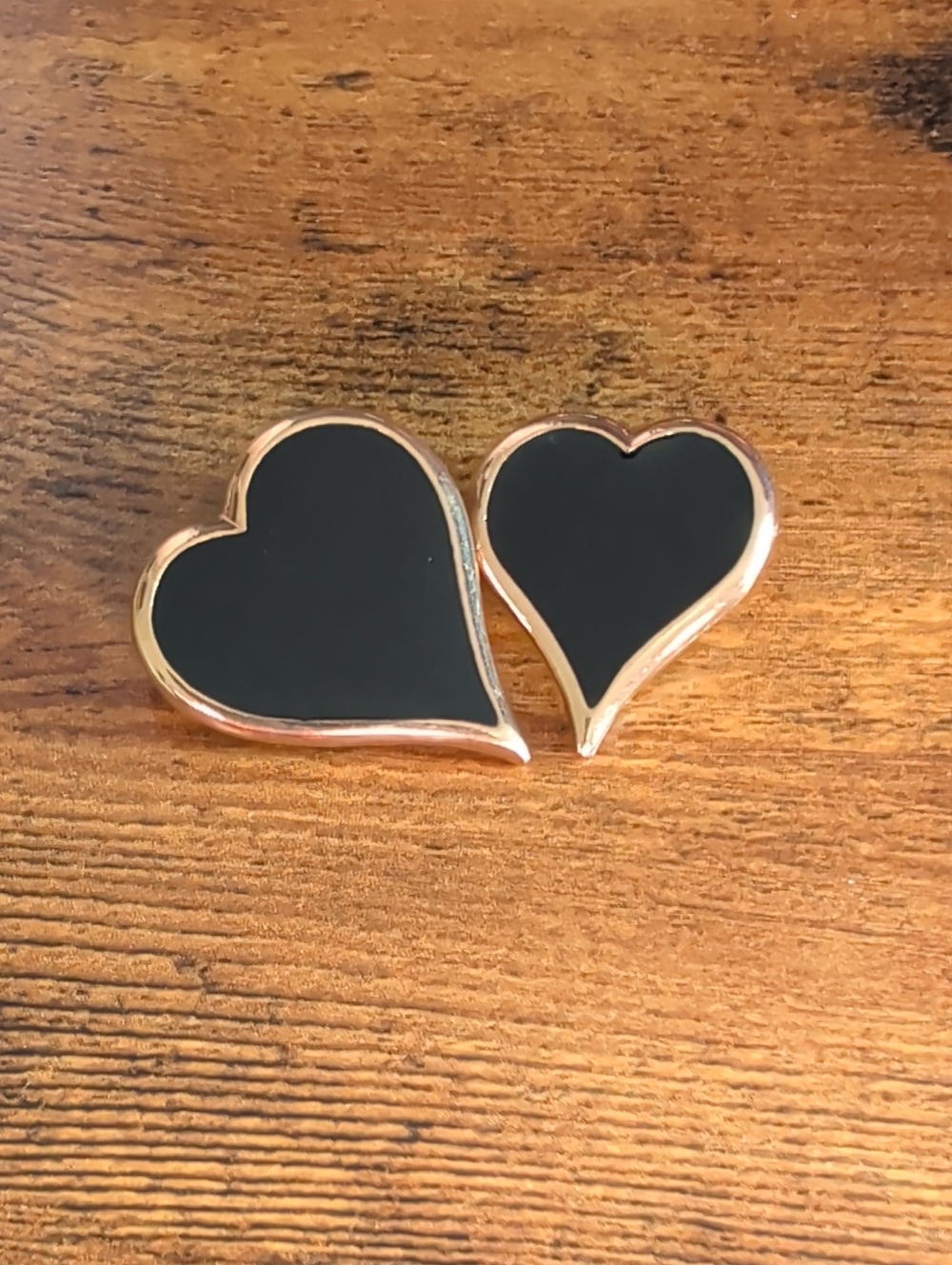 Vintage set of Sarah Coventry "Black Magic" enamel and gold-tone heart pins